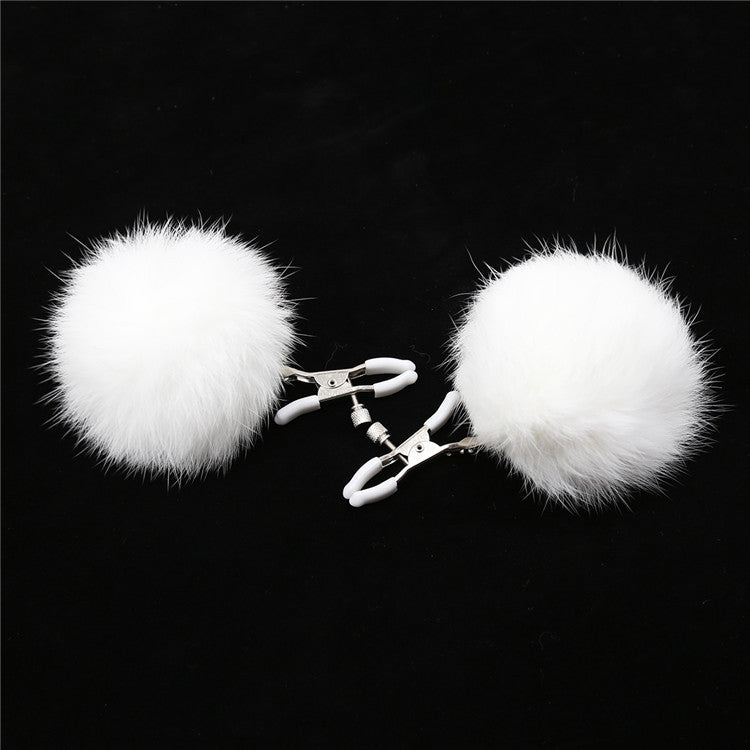 The Horny Company - Black Dragon Noir Pom Nipple Clamps White